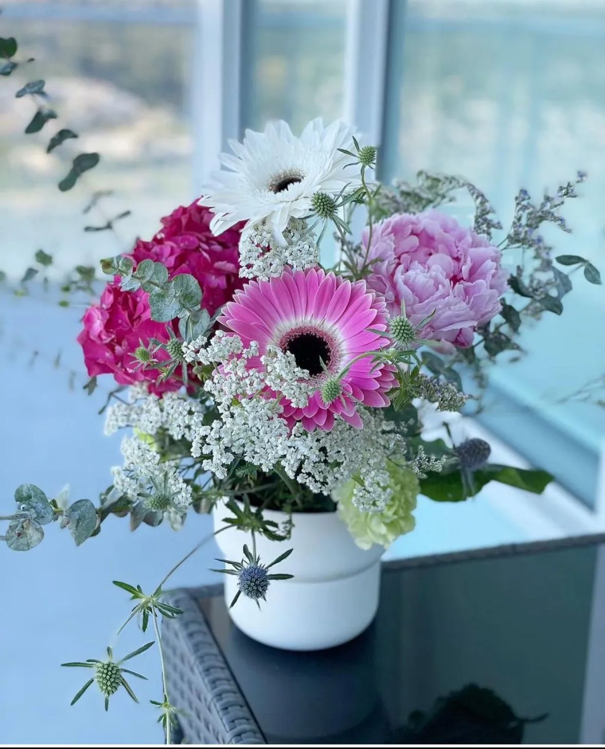 Peach dahlia and rose table centerpiece