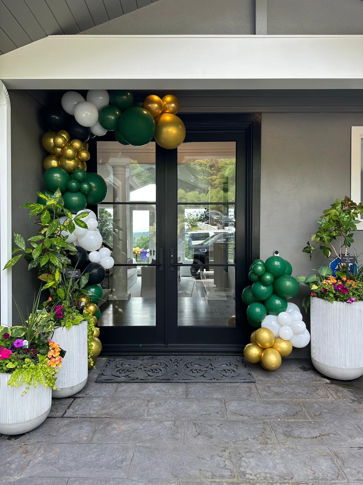 OPS nonprofit branded balloon arch with logo